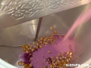 adding Glaze Pop to popcorn