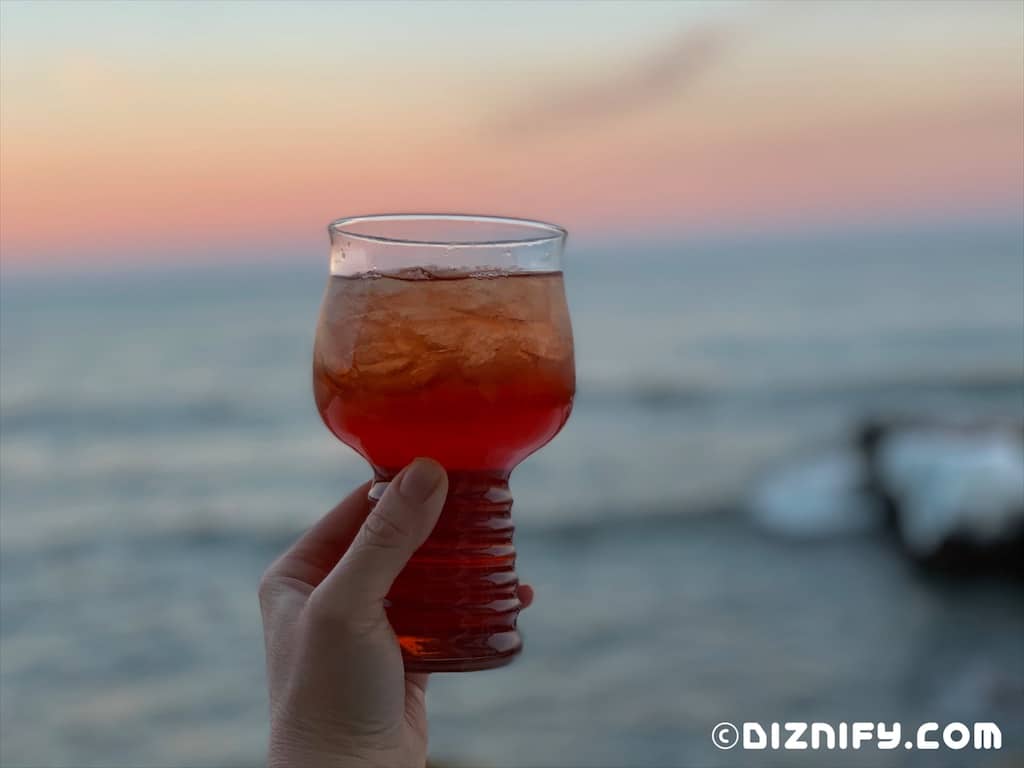 drink against a real sunset