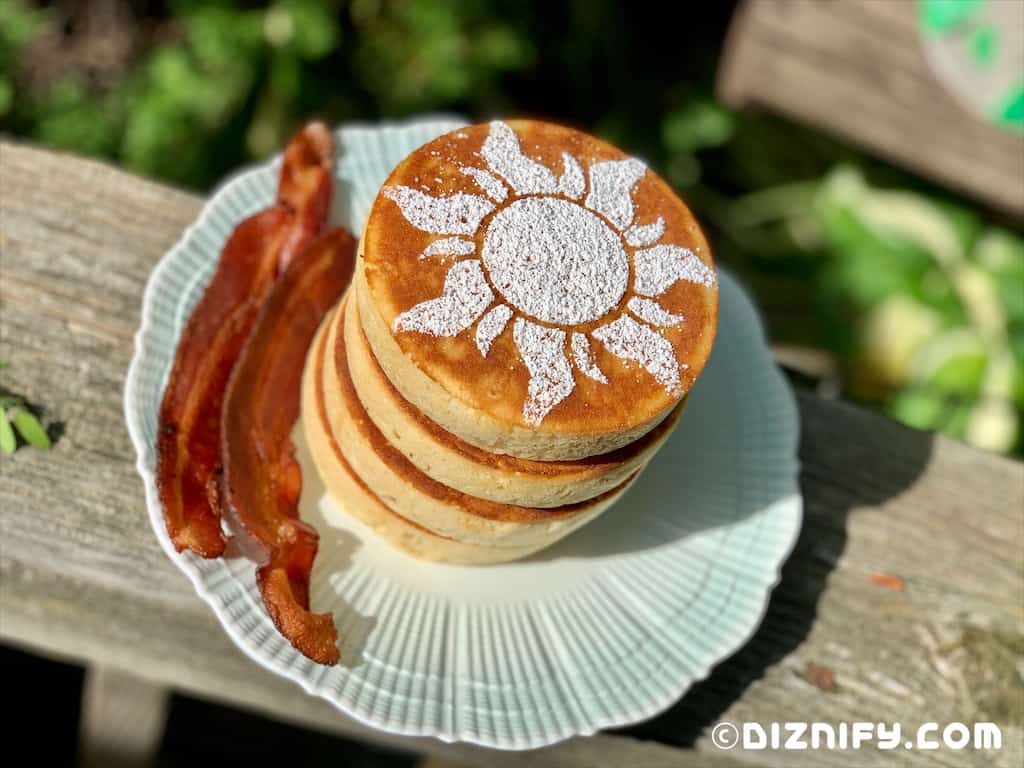 powdered sugar sun on top of pancakes