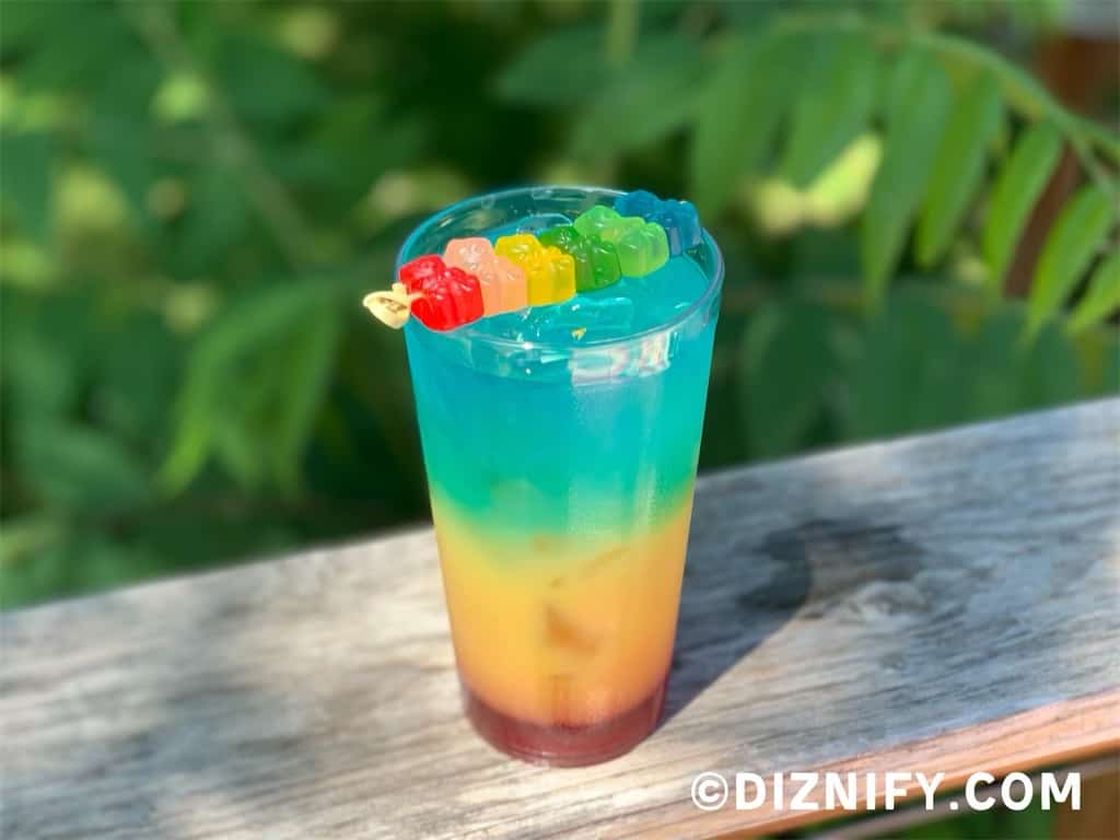 rainbow drink against green leaves